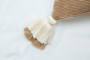 designer lumbar camel pillow with tassels 