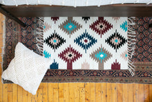 Load image into Gallery viewer, Small accent rug with blue designs 