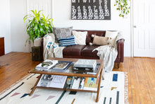Load image into Gallery viewer, Deep gray throw pillow with prints in light gray 24" x 24" set of two