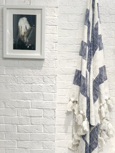 Designer striped throw in navy blue with tassels