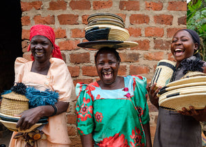 women artisans creators of our natural fiber wall art basket